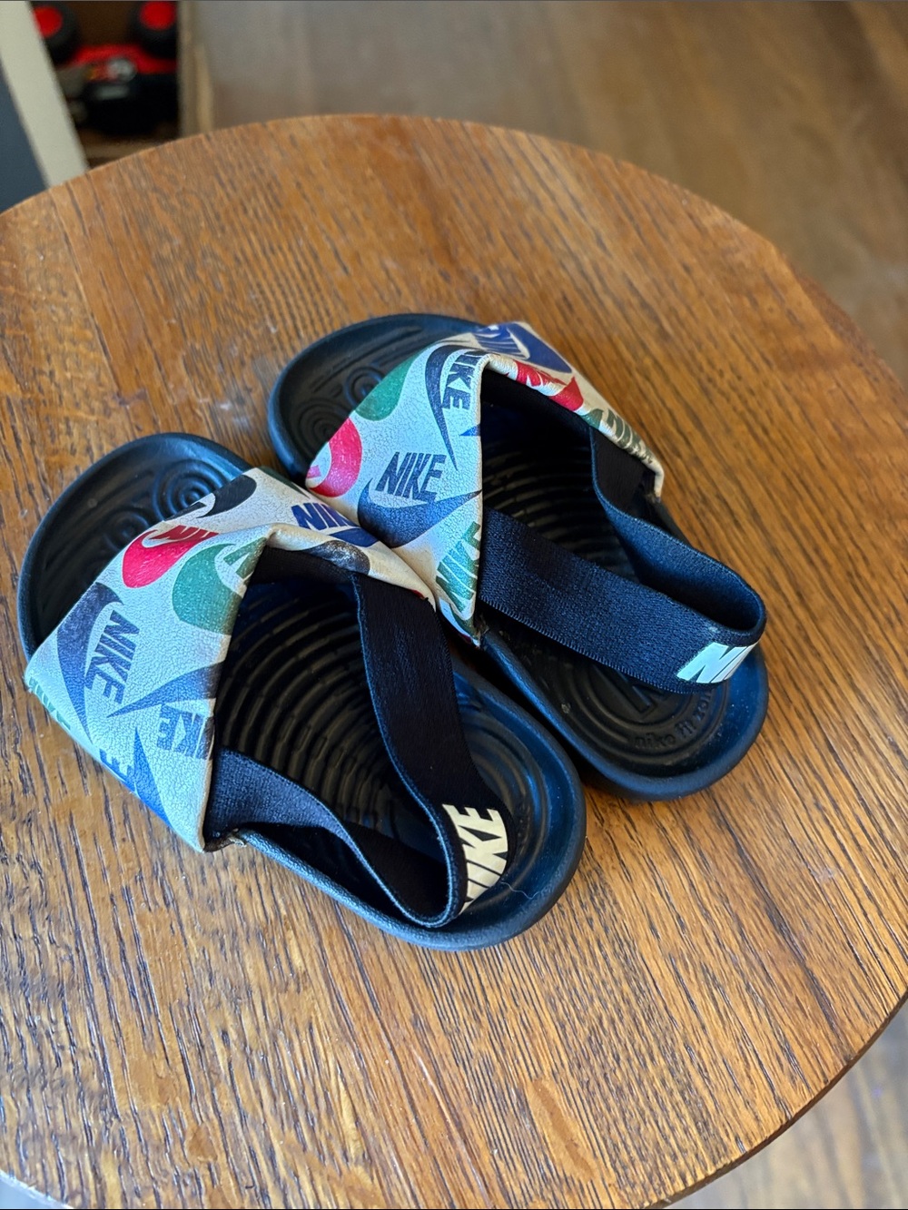 Nike Kids Black Slides with Multicolor Logo Strap